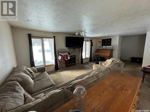 Acreage Near White Cap, Lomond Rm No. 37, SK - Indoor Photo Showing Living Room With Fireplace