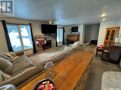 Acreage Near White Cap, Lomond Rm No. 37, SK - Indoor Photo Showing Living Room With Fireplace