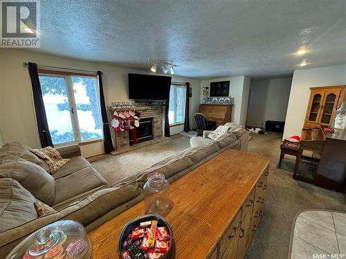 Acreage Near White Cap, Lomond Rm No. 37, SK - Indoor Photo Showing Living Room With Fireplace