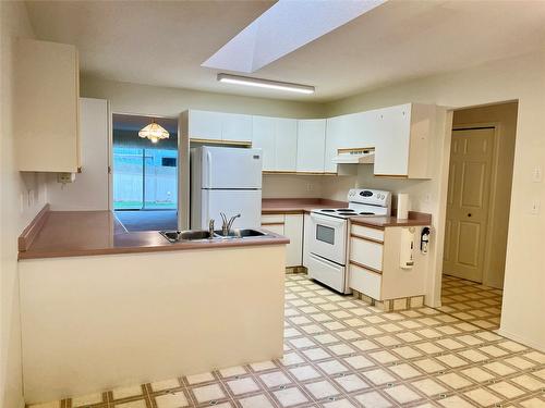 8-4210 Alexis Park Drive, Vernon, BC - Indoor Photo Showing Kitchen With Double Sink