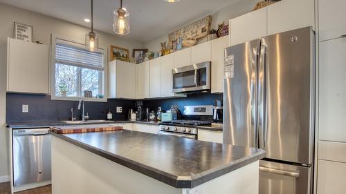 102-1236 Government Street, Penticton, BC - Indoor Photo Showing Kitchen With Stainless Steel Kitchen