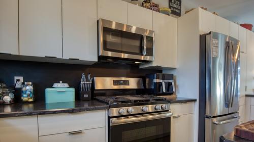 102-1236 Government Street, Penticton, BC - Indoor Photo Showing Kitchen With Stainless Steel Kitchen