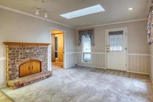 4587 Postill Drive, Kelowna, BC - Indoor With Fireplace