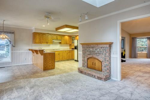 4587 Postill Drive, Kelowna, BC - Indoor With Fireplace