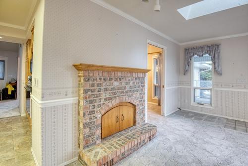 4587 Postill Drive, Kelowna, BC - Indoor With Fireplace