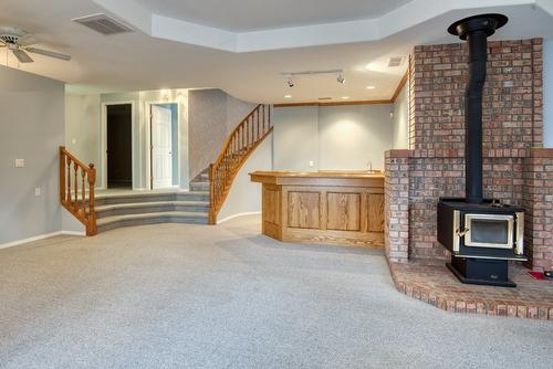 4587 Postill Drive, Kelowna, BC - Indoor With Fireplace