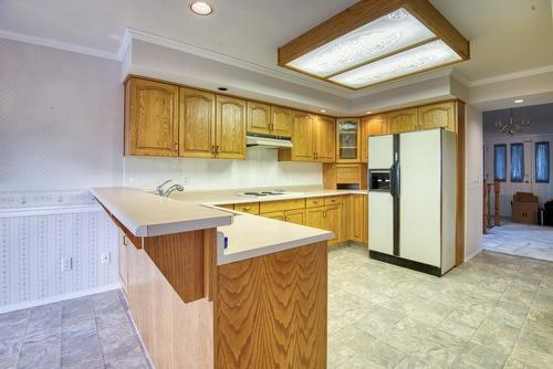 4587 Postill Drive, Kelowna, BC - Indoor Photo Showing Kitchen With Double Sink