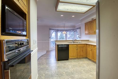 4587 Postill Drive, Kelowna, BC - Indoor Photo Showing Kitchen With Double Sink