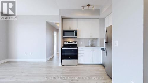 1409 - 3220 Sheppard Avenue E, Toronto, ON - Indoor Photo Showing Kitchen