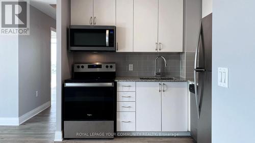 1409 - 3220 Sheppard Avenue E, Toronto, ON - Indoor Photo Showing Kitchen