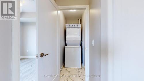 1409 - 3220 Sheppard Avenue E, Toronto, ON - Indoor Photo Showing Laundry Room