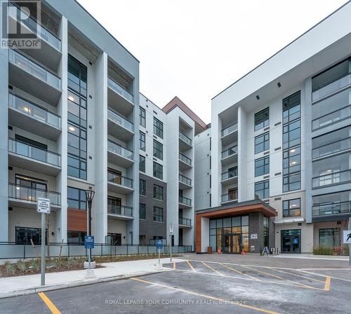 318 - 490 Gordon Krantz Avenue, Milton, ON - Outdoor With Balcony With Facade