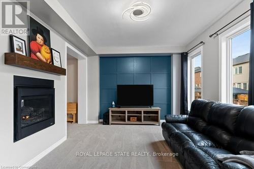 119 Brigham Avenue, Hamilton, ON - Indoor Photo Showing Living Room With Fireplace