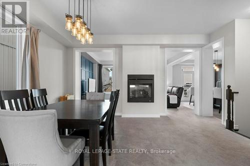 119 Brigham Avenue, Hamilton, ON - Indoor Photo Showing Dining Room With Fireplace