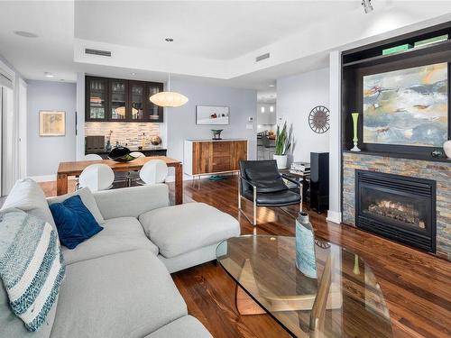 701-1400 Lynburne Pl, Langford, BC - Indoor Photo Showing Living Room With Fireplace