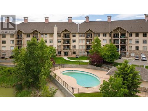 2551 Shoreline Drive Unit# 413, Lake Country, BC - Outdoor With In Ground Pool With Facade