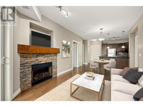 LV Virtually Staged - 3521 Carrington Road Unit# 114, West Kelowna, BC - Indoor Photo Showing Living Room With Fireplace