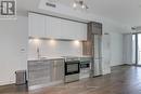 723 - 57 St Joseph Street, Toronto, ON  - Indoor Photo Showing Kitchen With Upgraded Kitchen 