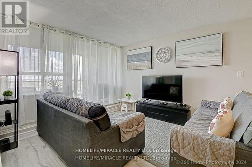 1404 - 100 Wingarden Court, Toronto, ON - Indoor Photo Showing Living Room