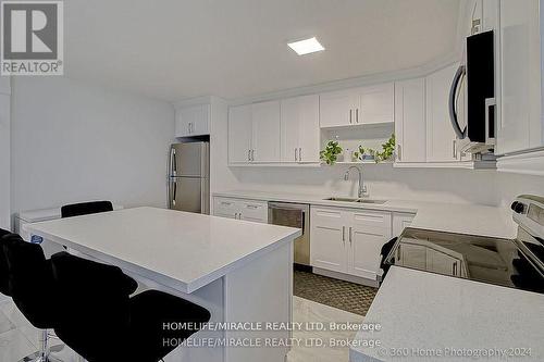 1404 - 100 Wingarden Court, Toronto, ON - Indoor Photo Showing Kitchen With Double Sink