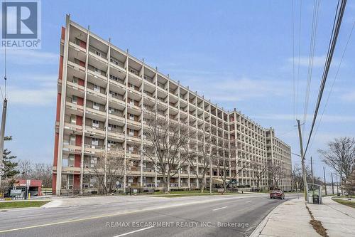 215 - 350 Quigley Road, Hamilton, ON - Outdoor With Facade