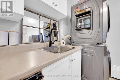 215 - 350 Quigley Road, Hamilton, ON - Indoor Photo Showing Laundry Room