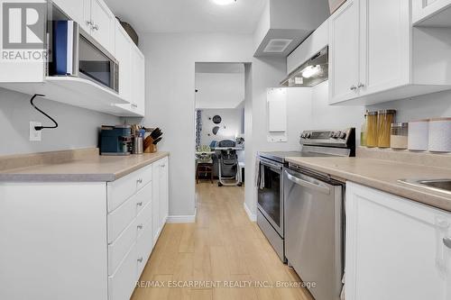 215 - 350 Quigley Road, Hamilton, ON - Indoor Photo Showing Kitchen