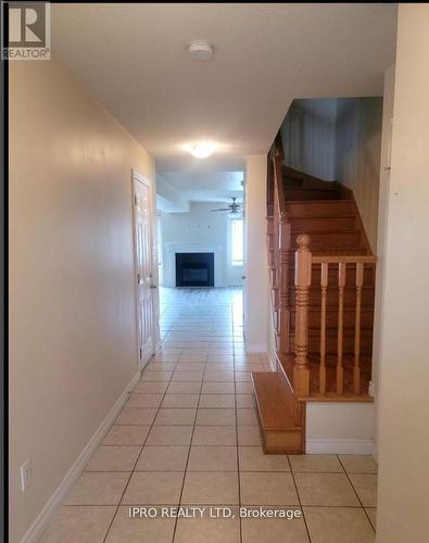 39 Waterbridge Street, Hamilton, ON - Indoor Photo Showing Other Room With Fireplace