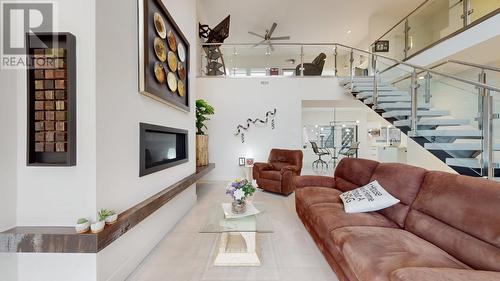 11706 Quail Ridge Place, Osoyoos, BC - Indoor Photo Showing Living Room With Fireplace