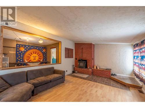 715 9Th Street S, Golden, BC - Indoor Photo Showing Other Room With Fireplace