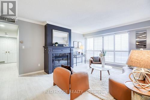 704 - 1818 Bayview Avenue, Toronto, ON - Indoor Photo Showing Living Room With Fireplace