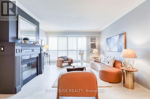 704 - 1818 Bayview Avenue, Toronto, ON - Indoor Photo Showing Living Room With Fireplace