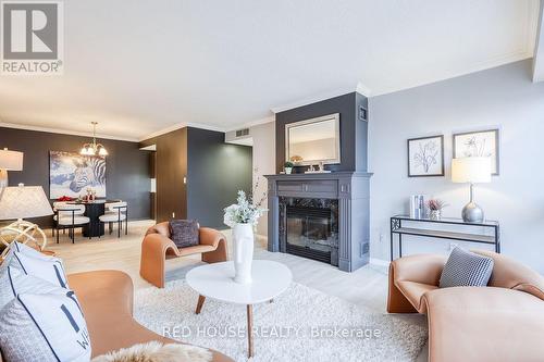 704 - 1818 Bayview Avenue, Toronto, ON - Indoor Photo Showing Living Room With Fireplace