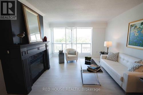 704 - 1818 Bayview Avenue, Toronto, ON - Indoor Photo Showing Living Room With Fireplace