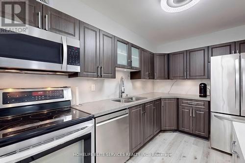 909 - 120 Dundalk Drive, Toronto, ON - Indoor Photo Showing Kitchen With Double Sink