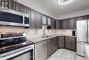 909 - 120 Dundalk Drive, Toronto, ON  - Indoor Photo Showing Kitchen With Double Sink 