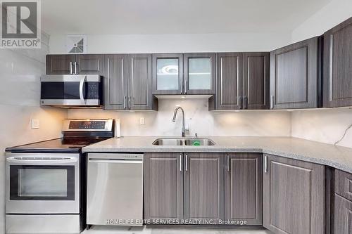 909 - 120 Dundalk Drive, Toronto, ON - Indoor Photo Showing Kitchen With Double Sink With Upgraded Kitchen