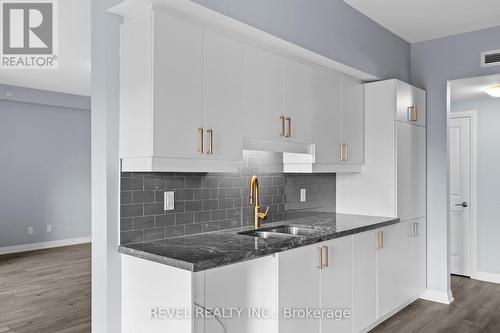 117 - 54 Koda Street, Barrie, ON - Indoor Photo Showing Kitchen With Double Sink