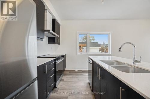 129 Colborne Street E, Orillia, ON - Indoor Photo Showing Kitchen With Stainless Steel Kitchen With Double Sink With Upgraded Kitchen