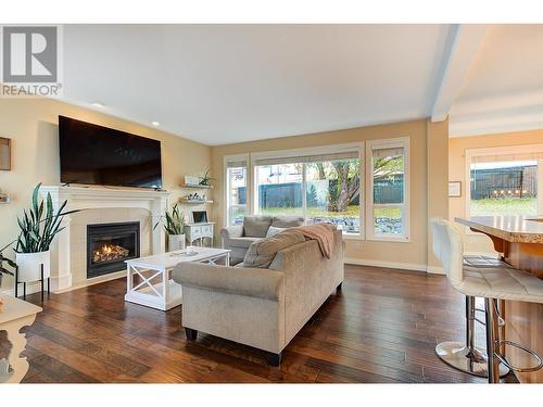 4897 Warbler Court, Kelowna, BC - Indoor Photo Showing Living Room With Fireplace