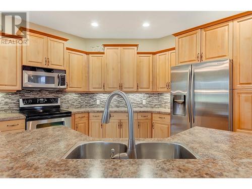 4897 Warbler Court, Kelowna, BC - Indoor Photo Showing Kitchen With Double Sink With Upgraded Kitchen