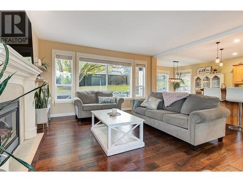 4897 Warbler Court, Kelowna, BC - Indoor Photo Showing Living Room With Fireplace