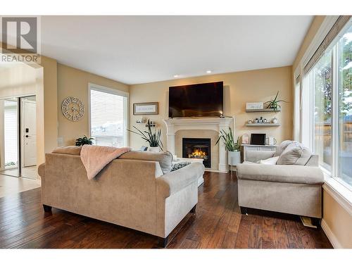 4897 Warbler Court, Kelowna, BC - Indoor Photo Showing Living Room With Fireplace