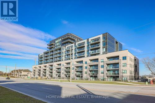 210 - 1475 Whites Road, Pickering, ON - Outdoor With Balcony With Facade