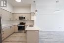 210 - 1475 Whites Road, Pickering, ON  - Indoor Photo Showing Kitchen With Stainless Steel Kitchen With Double Sink 