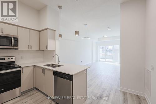 210 - 1475 Whites Road, Pickering, ON - Indoor Photo Showing Kitchen With Double Sink