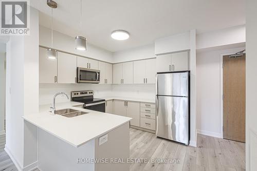 304 - 1475 Whites Road, Pickering, ON - Indoor Photo Showing Kitchen With Stainless Steel Kitchen With Double Sink With Upgraded Kitchen