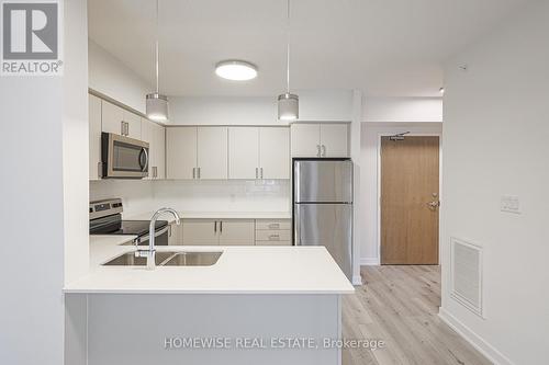 304 - 1475 Whites Road, Pickering, ON - Indoor Photo Showing Kitchen With Stainless Steel Kitchen With Double Sink