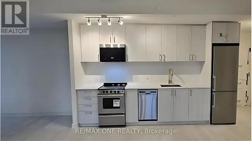 702 - 8010 Derry Road, Milton, ON - Indoor Photo Showing Kitchen