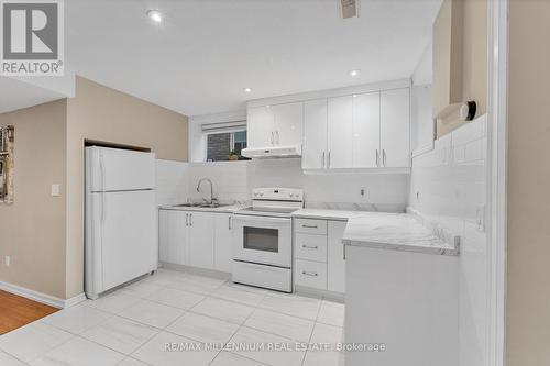 1053 Eager Road, Milton, ON - Indoor Photo Showing Kitchen With Double Sink